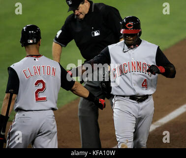 Cincinnati Reds' Brandon Phillips, right, is greeted at home plate by teammate Royce Clayton (2) after hitting a home run off Los Angeles Dodgers pitcher Mark Hendrickson in the second inning of a baseball game in Los Angeles on Tuesday, Aug. 29, 2006. Photo by Francis Specker Stock Photo