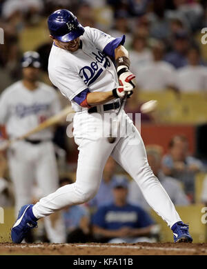 Los Angeles Dodgers'  Nomar Garciaparra hits a three-run homer off Colorado Rockies pitcher Aaron Cook in the third inning of a baseball game in Los Angeles on Saturday, Sept. 2, 2006. Photo by Francis Specker Stock Photo