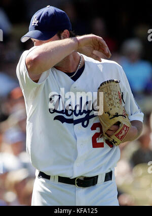 Los Angeles Dodgers pitcher Derek Lowe wipes his face after giving up a home run to San Diego Padres' Russell Branyan in the sixth inning of a baseball game in Los Angeles on Sunday, Sept. 17, 2006. Photo by Francis Specker Stock Photo