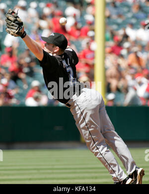 Toronto Blue Jays second baseman Aaron Hill tries to field an errant throw at second base by shortstop John McDonald on a play that scored Los Angeles Angels' Vladimir Guerrero in the third inning of a baseball game in Anaheim, Calif., on Sunday, Sept. 10, 2006. Photo by Francis Specker Stock Photo