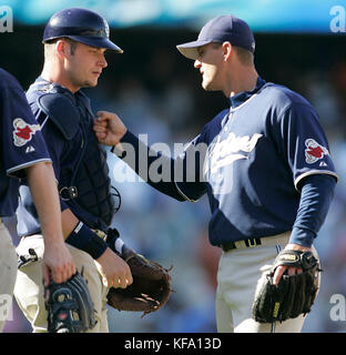 San Diego Padres relief pitcher Trevor Hoffman, right, celebrates with catcher Rob Bowen after saving a 2-1 victory over the Los Angeles Dodgers in a baseball game in Los Angeles on Sunday, Sept. 17, 2006. Photo by Francis Specker Stock Photo