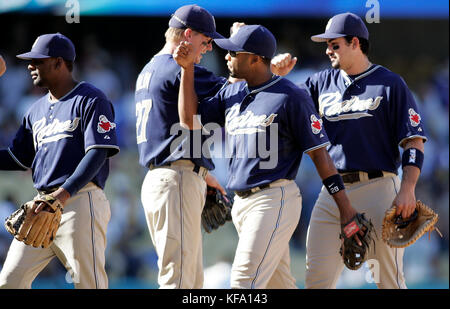 San Diego Padres', from left, Manny Alexander, Geoff Blum, Josh Barfield, and Adrian Gonzalez celebrate their 2-1 victory over the Los Angeles Dodgers in a baseball game in Los Angeles on Sunday, Sept. 17, 2006. Photo by Francis Specker Stock Photo