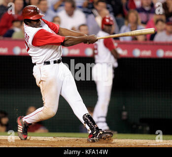 Boston Red Sox designated hitter David Ortiz rounds the bases after hitting  his 50th home run of the season off Minnesota Twins pitcher Boof Bonser  during the sixth inning at Fenway Park