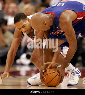Los Angeles Clippers' Howard Eisley, left, steals the ball away from Detroit Pistons' Chauncey Billups in the second half in Los Angeles on Sunday, Dec. 11, 2005. The Pistons won, 109-101.  Photo by Francis Specker Stock Photo