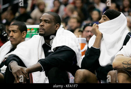 Philadelphia 76ers Andre Iguodala, left, Chris Webber, center, and John Salmons watch from the bench as their team loses 98-89 to the Los Angeles Clippers in the fourth quarter of an NBA basketball game in Los Angeles on Friday, March 17, 2006. Photo by Francis Specker Stock Photo
