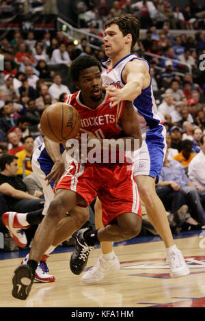 Houston Rockets' Aaron Brooks, left, and David Andersen, right, from ...