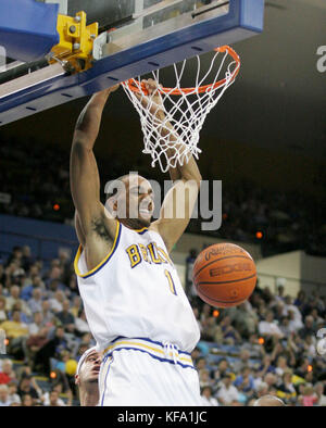 UCLA's Dijon Thompson dunks the ball against Michigan in the second half in Los Angeles on Saturday, Dec. 18, 2004. Thompson scored 29 points in UCLA's 81-79 win.  Photo by Francis Specker Stock Photo