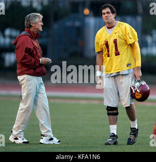 Southern California head football coach Pete Carroll, left, talks to quarterback Matt Leinart during a work-out in Los Angeles, Monday, Jan. 2, 2006. The Trojans face the University of Texas in the national championship game at the Rose Bowl on Wednesday, Jan. 4. Photo by Francis Specker Stock Photo