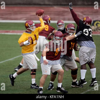 Southern California quarterback Matt Leinart, left, throws a pass over the defense during a work-out in Los Angeles, Sunday, Jan. 1, 2006. The Trojans face the University of Texas in the national championship game at the Rose Bowl on Wednesday, Jan. 4. Photo by Francis Specker Stock Photo