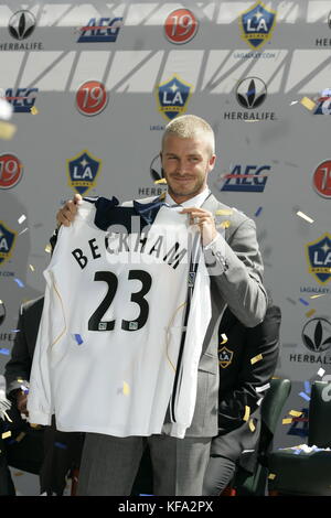 David Beckham holds up his jersey at the official presentation of David Beckham to the Los Angeles Galaxy at the Home Depot Center in Carson, CA on July13, 2007. Photo credit: Francis Specker Stock Photo