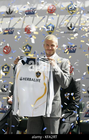 David Beckham holds up his jersey at the official presentation of David Beckham to the Los Angeles Galaxy at the Home Depot Center in Carson, CA on July13, 2007. Photo credit: Francis Specker Stock Photo