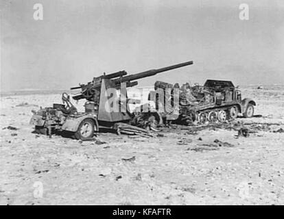 Burnt out 88 mm Flak 36 near El Alamein 1942 Stock Photo