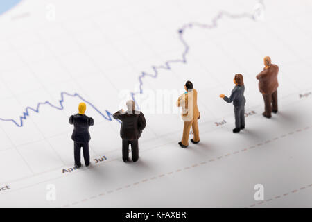 businessmen analyzing business financial graph reports concept Stock Photo
