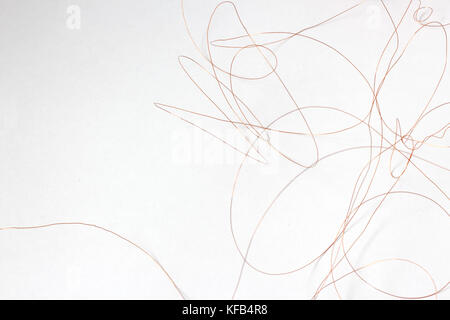 thin wire on white background Stock Photo