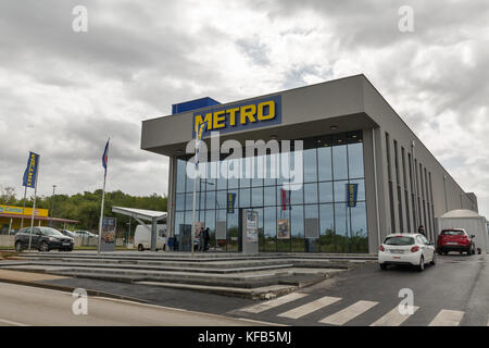 POREC, CROATIA - SEPTEMBER 12, 2017: People visit Metro Cash and Carry store. Metro is a German global diversified retail and wholesale, cash and carr Stock Photo