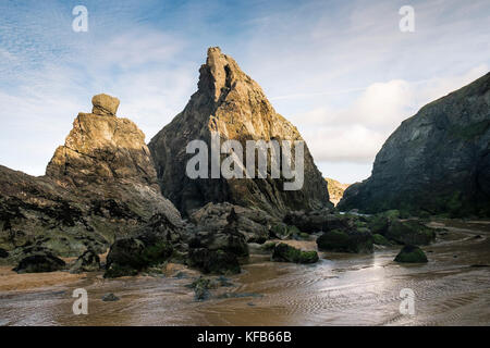 Holywell Bay in Cornwall - a stream running through rugged rocks at Holywell Bay in Newquay, Cornwall. Stock Photo