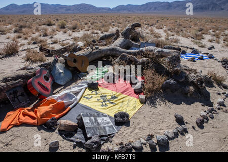 remains of the famous Joshua tree used as a photo location for the U2 album of the same name. fans have turned into a shrine just off hwy 190 California Stock Photo