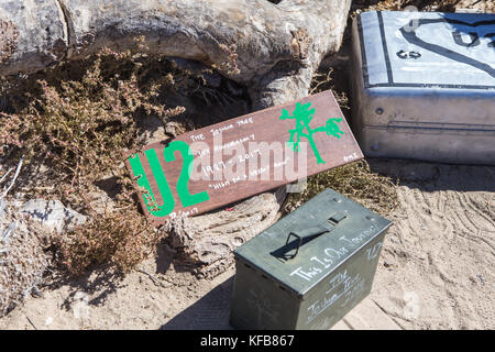 remains of the famous Joshua tree used as a photo location for the U2 album of the same name. fans have turned into a shrine just off hwy 190 California Stock Photo