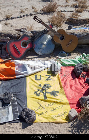 remains of the famous Joshua tree used as a photo location for the U2 album of the same name. fans have turned into a shrine just off hwy 190 California Stock Photo