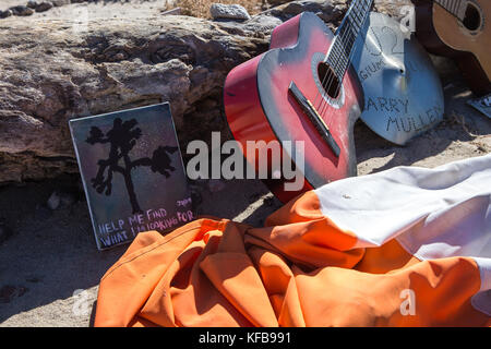 remains of the famous Joshua tree used as a photo location for the U2 album of the same name. fans have turned into a shrine just off hwy 190 California Stock Photo