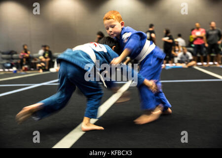 USA, Oahu, Hawaii, young boy Jujitsu Martial Arts fighters grapple at  the ICON grappling tournament in Honolulu Stock Photo