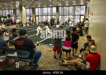 USA, Oahu, Hawaii, young boy Jujitsu Martial Arts fighters grapple at  the ICON grappling tournament in Honolulu Stock Photo