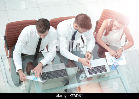 Image of a business people working in a modern office. Top view. Stock Photo