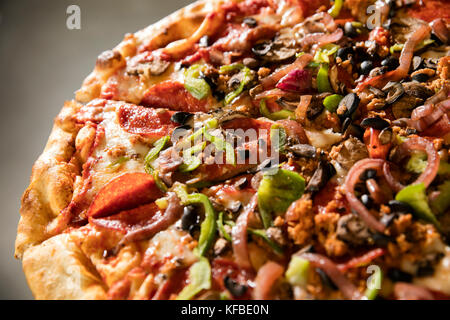USA, Oregon, Bend, Pacific Pizza and Brew, up close of sausage pizza slices Stock Photo