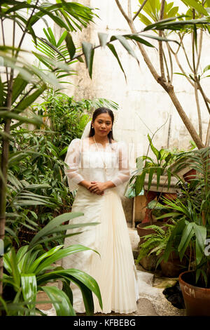 PHILIPPINES, Manila, portrait of Ana Ma-An, a bride before her wedding in the Intramros District Stock Photo