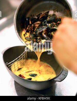 USA, Nevada, Las Vegas, plating the mussells dish at Bouchon Restaurant ...