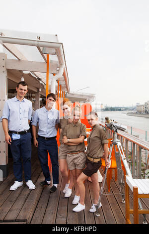 RUSSIA, Moscow. RUSSIA, Moscow. Staff at the roof restaurant at Bar Strelka which overlooks the Moscow River. Stock Photo