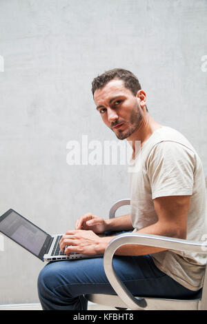 RUSSIA, Moscow. Portrait of staff, editors, writers at Snob Magazine Office in the old Red October Chocolate Factory. Stock Photo