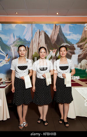 RUSSIA, Moscow. Portait of staff at Koryo, a North Korean restaurant in Moscow. Stock Photo
