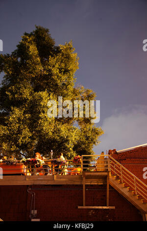 RUSSIA, Moscow. Night scene at Red October, a former chocolate factory that has reopened new bars and restaurants. Stock Photo