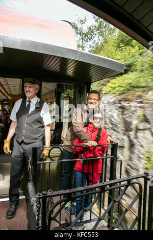 USA, Alaska, Sitka, passengers take in the views while aboard the White Pass & Yukon Route Railroad from the town of Sitka up and into Canada Stock Photo