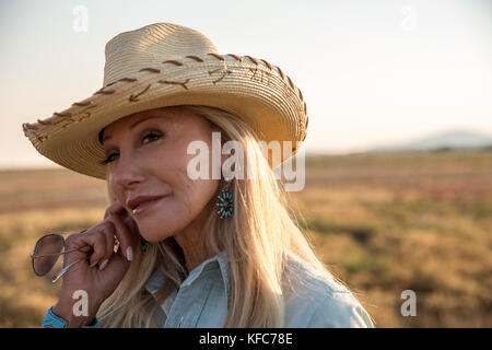 USA, Nevada, Wells, Founder Madeleine Pickens walks around the her 900 square mile property in NE Nevada where Mustang Monument, A sustainable luxury  Stock Photo