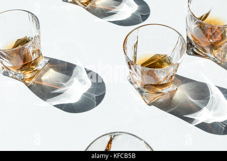 cognac in glasses with shadows     Stock Photo