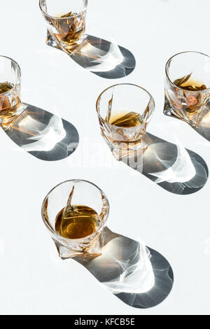 whiskey in glasses with shadows      Stock Photo