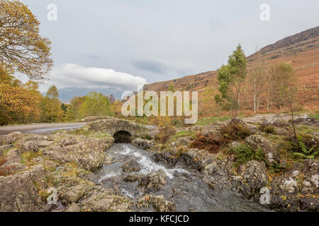 Autumn at Ashness Bridge a traditional stone bridge in Borrowdale, Lake District National Park, England, UK Stock Photo