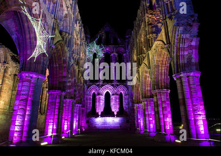 Illuminated Whitby Abbey in Whitby, North Yorkshire Stock Photo