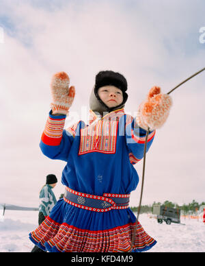 FINLAND, Hemet, Arctic, a Sami boy wearing the traditional Sami outfit during a Sami Festival in Hemet. Stock Photo