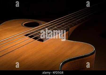 Closeup of a brown accoustic bass low key Stock Photo