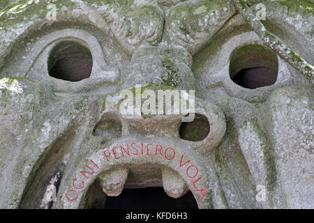 BOMARZO, ITALY - 2 JULY 2017 - Orcus mouth sculpture at famous Parco dei Mostri (Park of the Monsters), also named Sacro Bosco (Sacred Grove) or Garde Stock Photo