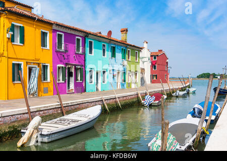 VENICE ITALY VENICE Colourful houses along a canal on the Island of Burano Venice lagoon Metropolitan City of Venice Italy EU Europe