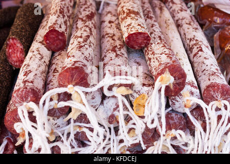 Close-up of Spanish meat sausages (salchichon and fuet) for sale at Sineu market, Majorca, Spain Stock Photo