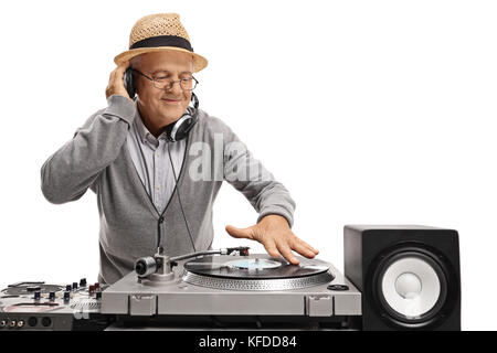 Old DJ playing music on a turntable isolated on white background Stock Photo