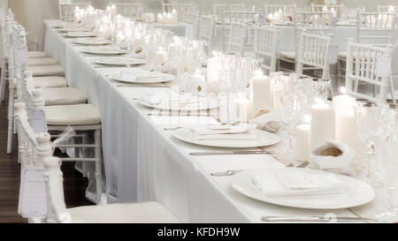 Table set for an event party or wedding reception with candles Stock Photo