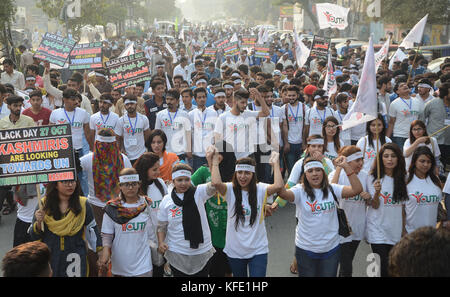 Lahore, Pakistan. 28th Oct, 2017. Pakistani students from different schools, colleges and universities gather during a protest 'Black Day' rally organised by Youth Forum for Kashmir. Kashmiris protesters are observing 'Black Day' to mark the occupation of Jammu and Kashmir by India. Kashmir is divided between India and Pakistan by a de facto border known as the line of control but it is claimed in full by both countries. Credit: Rana Sajid Hussain/Pacific Press/Alamy Live News Stock Photo