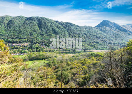 Landscape of the province of Varese between Varese town and Lake Maggiore, Italy. Valganna, village of Ganna and the small Ganna lake. Stock Photo