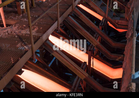 Liquid glass - production line in glassworks Stock Photo - Alamy